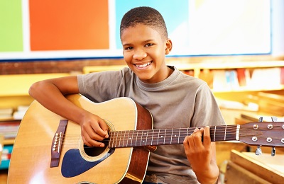 child with a guitar